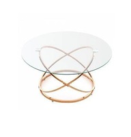 Table basse ronde en verre au design ultime avec base en métal finition dorée, contemporaine pour le salon et la maison