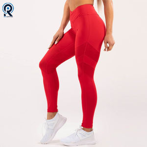 Venta al por mayor Fitness Mujeres Deporte Leggings sin costuras Cintura alta Elástico Sólido Yoga Leggings Gimnasio Pantalones Ropa deportiva - Product Image 2