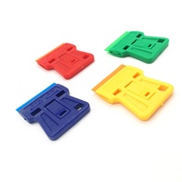 Grattoir portable avec poignée en plastique et lame