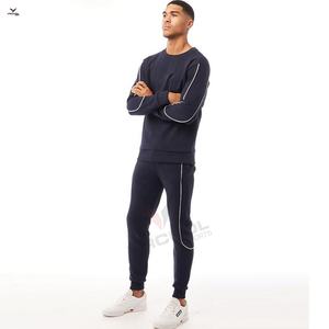 Venta al por mayor de chándal de jogging de forro polar personalizado para hombre, diseño de cremallera con capucha para ejercicio de invierno, gama de estampado sólido, hilo teñido - Product Image 1