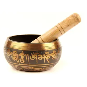 Brass tibetan singing bowls used for deep relaxation and muscle regeneration body and mind with hand etching brown&goold color