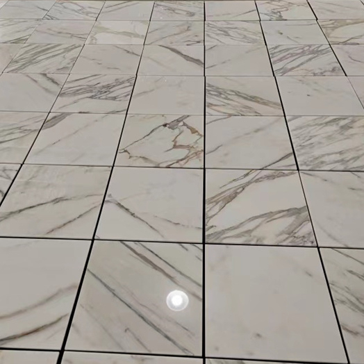 China Manufacturer Top Quality 10mm Thick Calacatta Gold Marble Floor Tile for Decor