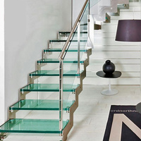 Escalier en verre DAIYA avec marches en verre laminé transparent et contremarche à finition miroir