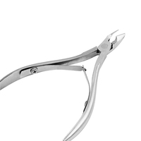 Vente chaude : Coupe-cuticules multifonctionnel haut de gamme en acier inoxydable à double ressort pour pédicure et soin des ongles des orteils