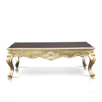 Table basse ROMAWI en bois massif sculpté avec couleur dorée