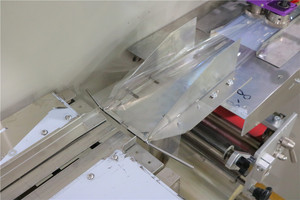 Machine d'emballage automatique pour aliments congelés en plastique à flux automatique TCZB-250X - Product Image 6