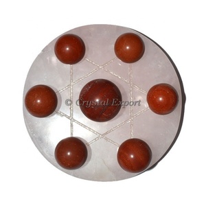 Estrella de David Tallada con 7 Bolas de Jaspe Rojo sobre Base de Cuarzo Rosa - Product Image 1