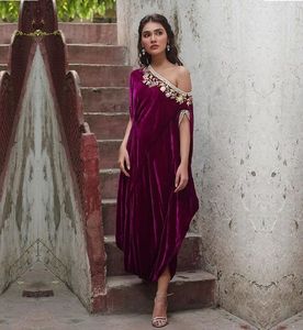 Beauteous Velvet Off Shoulder Deep Orchid Color <b>Kaftan</b> Embroiderered Front Neckline Back Work Zari Stones Dabka Naqshi <b>Sequins</b> - Product Image 1