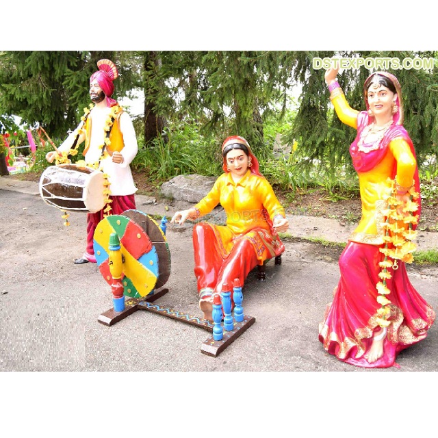 Punjabi Dance Statues Elegant Fiber Carved Statues
