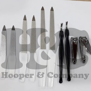 Offre Spéciale usine directe 12 pièces Kit de manucure de beauté en caoutchouc en acier inoxydable pour enfants avec coupe-ongles et fournitures - Product Image 4