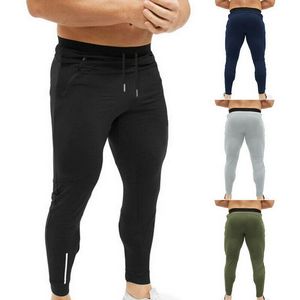 Pantalones de gimnasio de secado rápido para hombre - Product Image 1