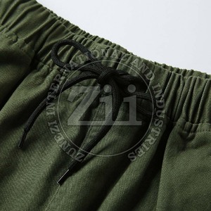 Vente à chaud Short d'été en coton pour hommes Cargo décontracté à 6 poches avec motif solide Jeans écologiques à vente chaude - Product Image 6