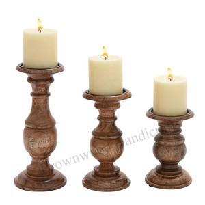 Juego de portavelas de madera tallada a mano, Set de 3 piezas de Mango tallado a mano de fabricante indio y exportación a precio asequible - Product Image 1