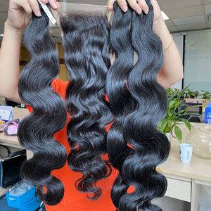 Extensions de cheveux humains Remy non traités en gros, 6-32 pouces, ondulés, double trame, cheveux bruts cambodgiens et vietnamiens pour tissage - Product Image 1