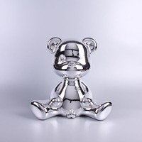 Sculpture moderne d'ours en or Figurine en résine d'art tendance pour la décoration de la maison Ornement de bureau Statue décorative de style pop