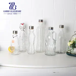 Wholesale Cheap Machine-made Glass Water Drinking Milk Bottle Jar with Non-toxic Metal Lid Customized Design for Supermarket