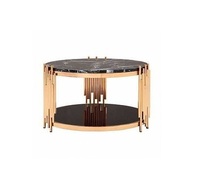 Table basse ronde de style indien et italien avec plateau en marbre et structure en métal finition cuivre, mobilier contemporain pour salon