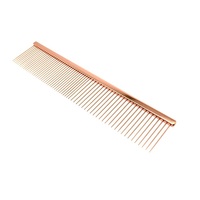 Peigne de toilettage pour animaux de compagnie de haute qualité, écologique, avec manche en cuivre et rangée de picots ronds pour un soin facile des animaux.