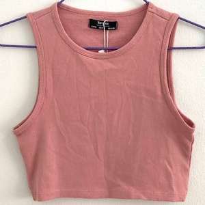 เสื้อกล้ามแขนกุดลำลองสำหรับผู้หญิง สีพื้น ผ้าสแปนเด็กซ์/ผ้าฝ้าย เหมาะสำหรับใส่ในฤดูร้อน รับผลิตแบรนด์ตามสั่ง มีสินค้าในสต็อก คุณภาพดี สวมใส่สบาย - Product Image 4