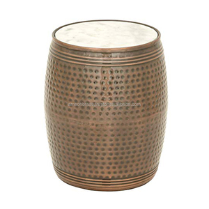 Table basse en marbre et métal finition antique, plateau en marbre, tabouret tambour martelé finition bronze pour coin de maison - Product Image 1