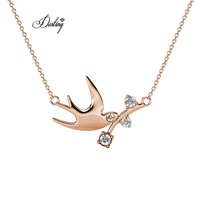 Pendentif oiseau colombe flambée Daisini orné de cristaux Swarovski Collier plaqué or blanc 18 carats de haute qualité