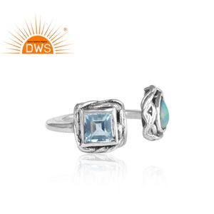 แหวนเงินแท้ 925 ชุบออกซิไดซ์ ปรับขนาดได้ ประดับด้วยบลูโทแพซธรรมชาติและโอปอลเอธิโอเปีย ดีไซน์ทันสมัย เหมาะสำหรับงานแต่งงาน งานครบรอบ และงานปาร์ตี้ - Product Image 3