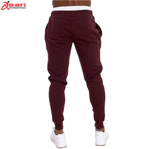 กางเกงวอร์มผู้ชายลำลองสีดำระบายอากาศกางเกงวิ่งกางเกงโพลีเอสเตอร์พร้อมกระเป๋าคาดเอวสูงผ้ากันลม - Product Image 3