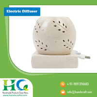 Diffuseur d'huiles essentielles électrique |   Diffuseur d'arômes en céramique artisanal pour la relaxation à domicile, vente en gros, fabricant indien, vente chaude