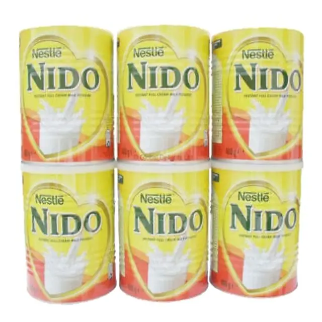 Kırmızı ve beyaz Nestle Nido süt tam krem takviyeli 6x1800g süt tozu