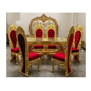 Juego de mesa de comedor de 6 plazas de madera de teca tallada a mano de lujo con acabado dorado antiguo diseño moderno para uso doméstico - Product Image 1