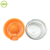 Handmatige citruspers van glas en kunststof, gemaakt in Taiwan, met opvangbak voor sinaasappel/limoen, makkelijk schoon te maken.