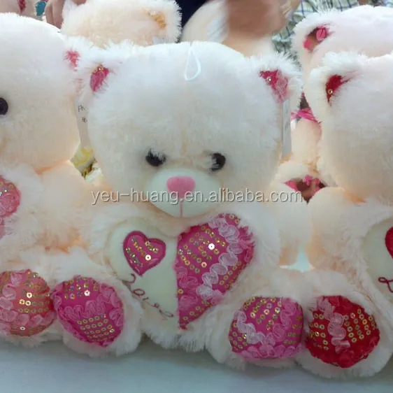 Beruang Teddy Valentine dengan Boneka Hewan Hati