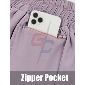 Pantalones cortos deportivos de secado rápido para mujer, Shorts de entrenamiento con bolsillos y cintura elástica para correr - Product Image 4