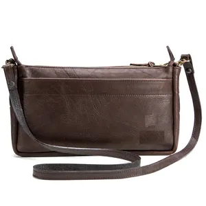 Small women leather wallet in brown leather with zippers and handle