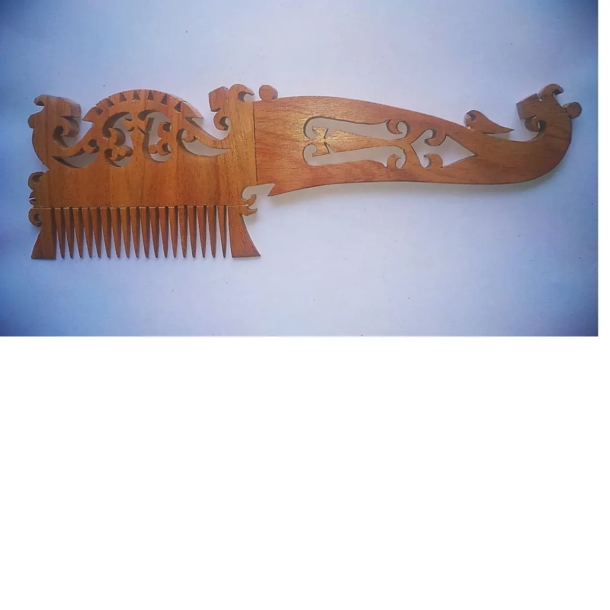 custom made hand carved wood combs available in assorted designs