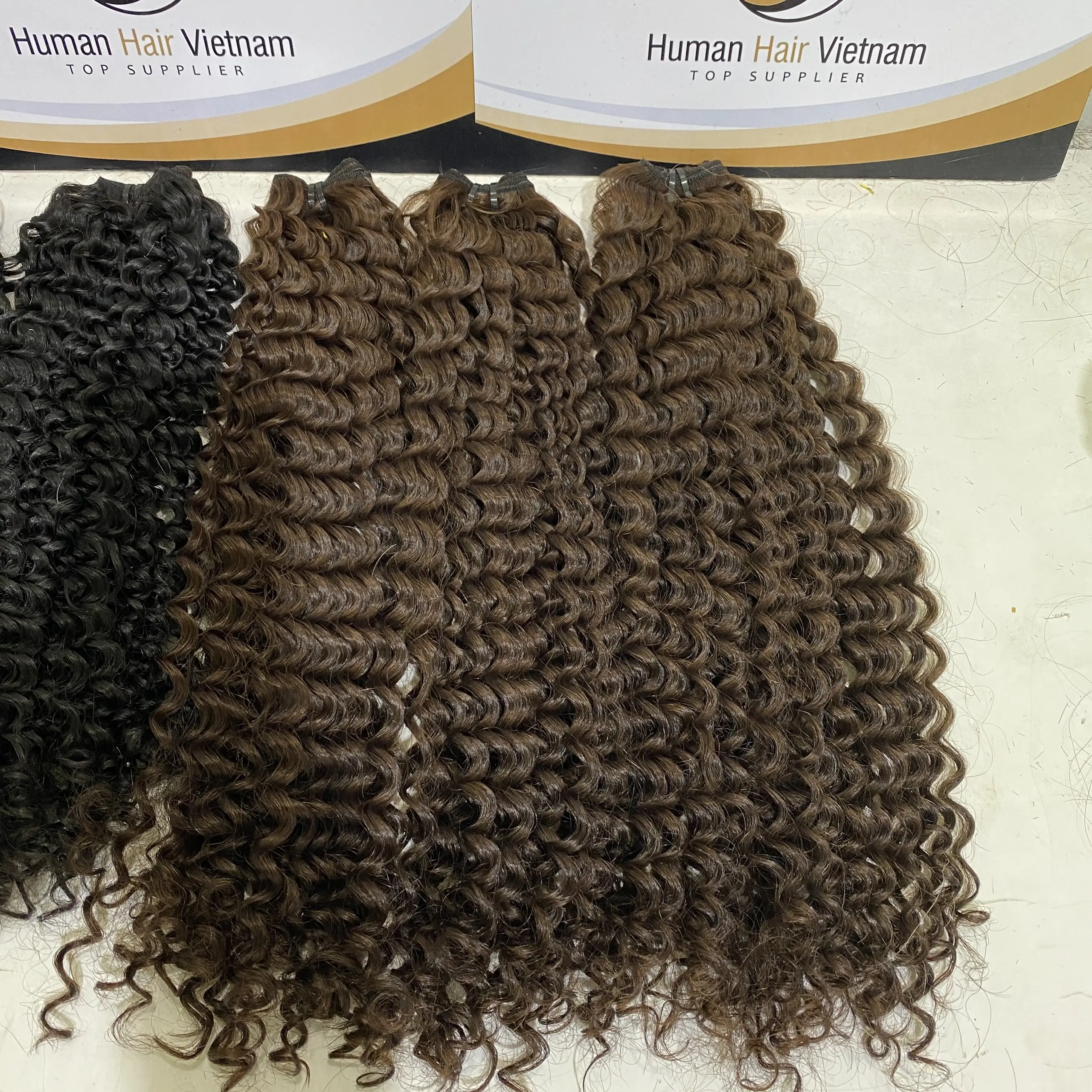 Human Hair Vietnam hot sale unprocessed virgin hair weave deep curly hair extensions bundles wholesale vendors for black women