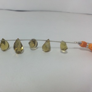 7mm 8mm 9mm Natural Champagne Cuarzo Piedra Facetada Twisted Drop Briolette Cuentas de piedras preciosas Hebras a precio al por mayor en línea AAA - Product Image 2