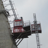 Ascenseur de chantier à double cage SC200/200 à crémaillère pour projets de construction en grande hauteur