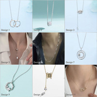 Bas quantité minimale de commande 10 pièces gros bijoux drame coréen garçons sur fleurs femmes creux lune cristal pendentif baiser étoile collier