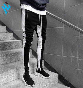 กางเกงวอร์มเข้ารูปสำหรับผู้ชายกางเกงผ้าฝ้ายแบบมีซิปสำหรับออกกำลังกายฟิตเนสแบบกำหนดเอง - Product Image 2