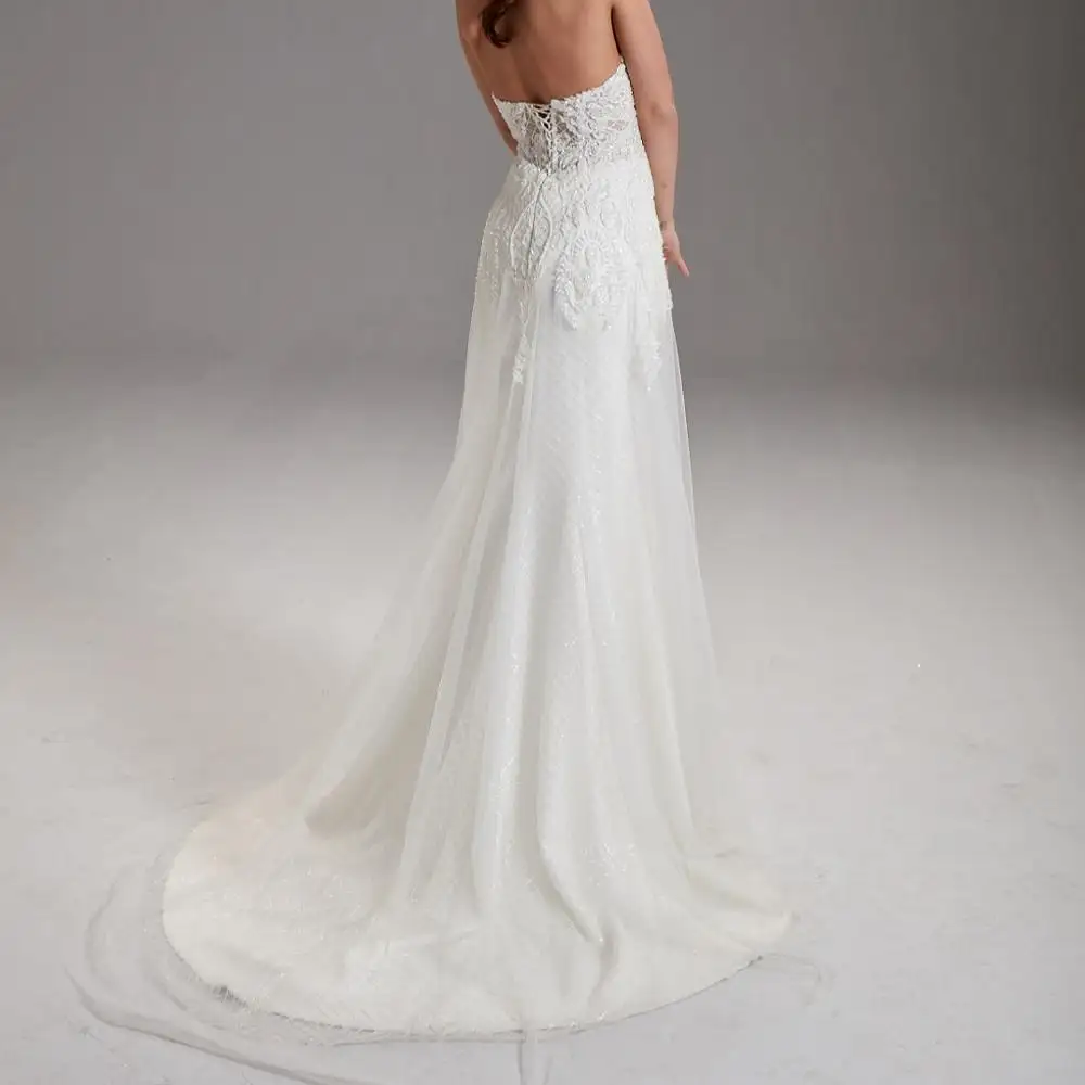 Sweetheart neck bodice of this sultry Crepe Sheath gown