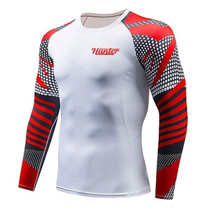 Diseñador de moda personalizado impreso al por mayor colores brillantes Logo manga corta transpirable hombres Rash Guard - Product Image 3