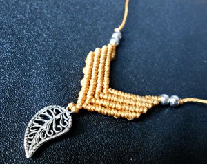 Gold color adjustable necklace with leaf pendant and <b>silver</b> <b>beads</b> Unique Handmade Collection - Product Image 1