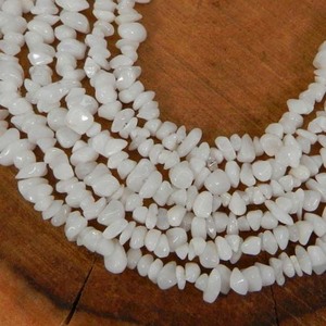 ลูกปัดโอนิกซ์สีขาวธรรมชาติขนาด36นิ้ว231 CTS สำหรับทำเครื่องประดับ - Product Image 1