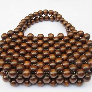 Hermosa bolsa vintage de madera de Vietnam - Product Image 1