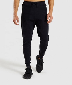 ReviveFit Pantalon de survêtement haute performance pour homme Jogging en coton doux Taille élastique Confort amélioré Flexibilité Durabilité pour - Product Image 1