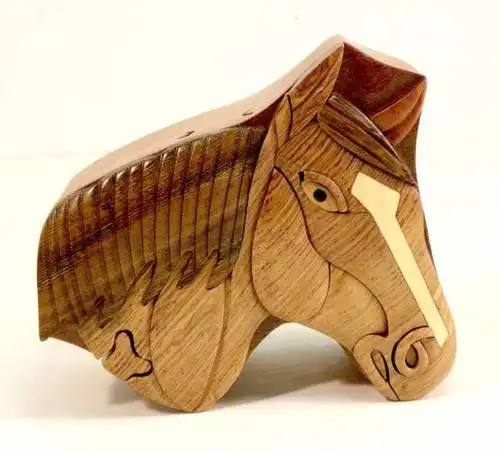 Wooden puzzle box in horse shape mind teaser
