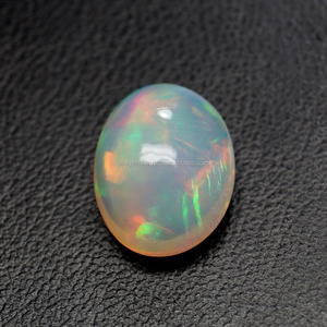 Atractiva piedra preciosa de ópalo etíope Welo Arco Iris llamativo piedra de ópalo liso pulido cabujón de ópalo Etíope para fines de joyería - Product Image 1