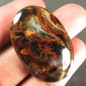 Rare Chatoyant Pietersite stone and rough pietersite