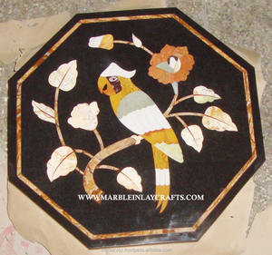 Mesa decorativa con incrustaciones de mármol negro - Product Image 1